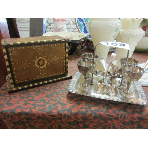 159 - Silver plated egg cup set plus inlaid box.