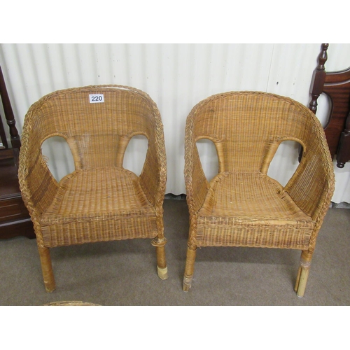 220 - Pair of cane armchairs in need of restoration.