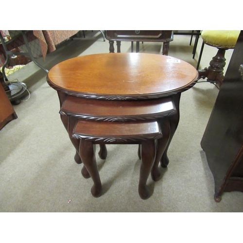 234 - Nest of 3 mahogany tables.