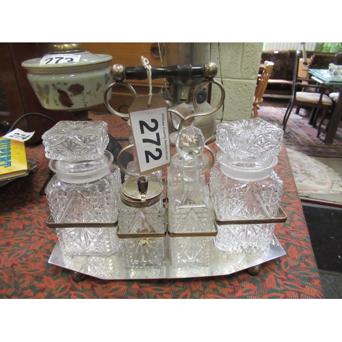 272 - Glass condiment set in silver plate stand.