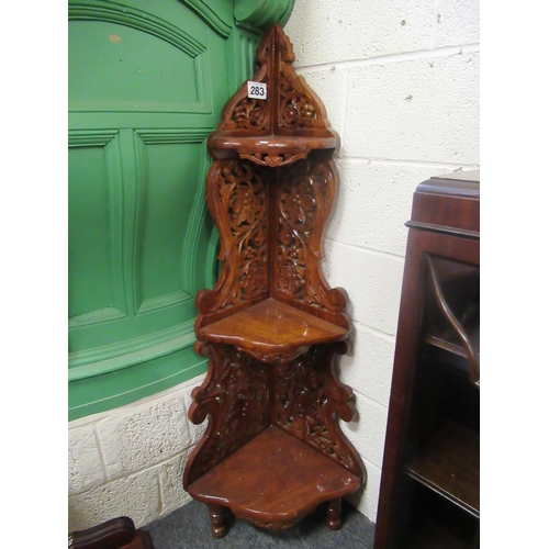 283 - Carved mahogany 3 tier corner what not.  H: 142cm.