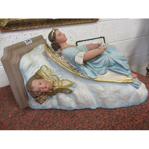 296 - Large religious wall mounted Corbel depiction Angles.  H:75cm x W:47 x 35cm.