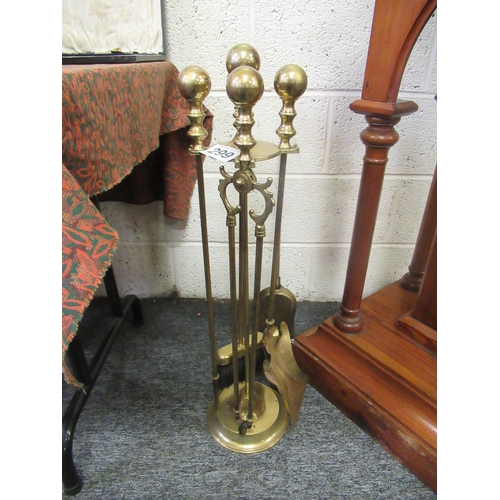 299 - Good brass companion set.