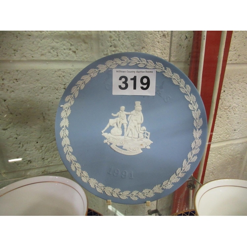 319 - 3 Wedgwood wall plaques.  Diameter 21cm.