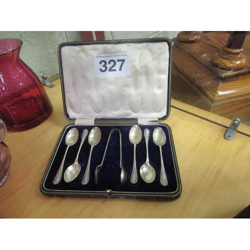 327 - Silver cased spoons and tongs.