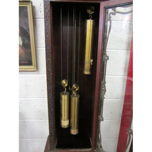 339 - Superb Georgian mahogany carved long case clock with brass and enamel dial.  H:230cm.