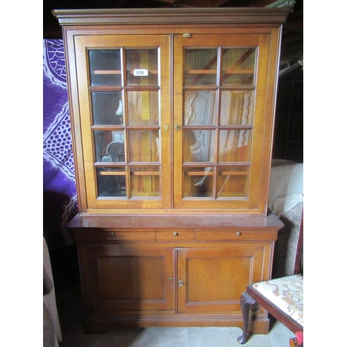 35 - Good mahogany glazed top bookcase.