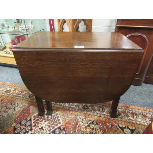 380 - Vintage oak drop leaf table on pad feet.  H:75cm, Top when opened: 148cm x 88cm.