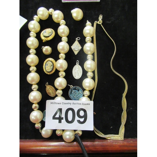 409 - Dress necklace, earrings plus religious medals.