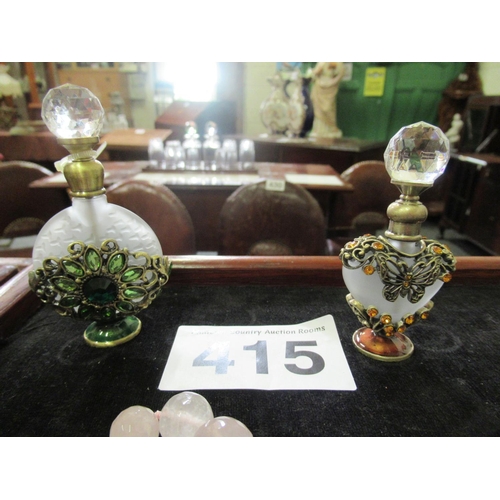 415 - 2 vintage perfume bottles.