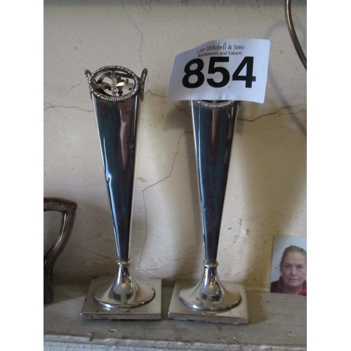 854 - Pair of Georgian silver bud vases highly decorative.  H:6 inches.