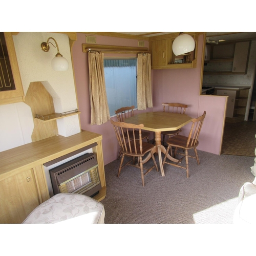 21 - 34' 2 bedroom Applause Mobile home in good condition.