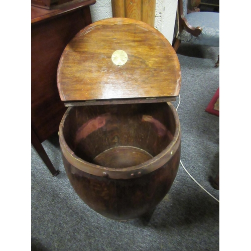 49 - Victorian Mahogany brass bound log barrel.