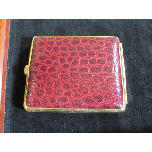127 - Plated leather covered cigarette case - never used.