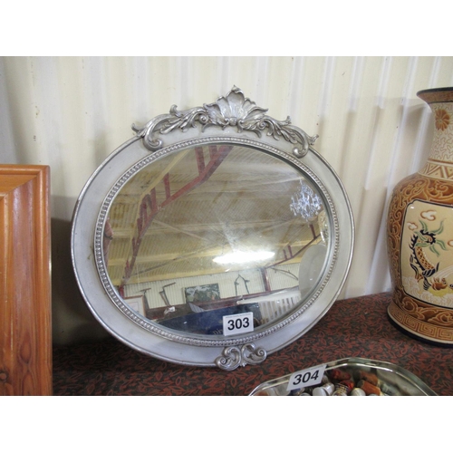 303 - Oval Wall mirror. 58cm x 53cm.