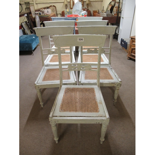326 - Set of 7 Painted and destressed  dining chairs with cane seats.