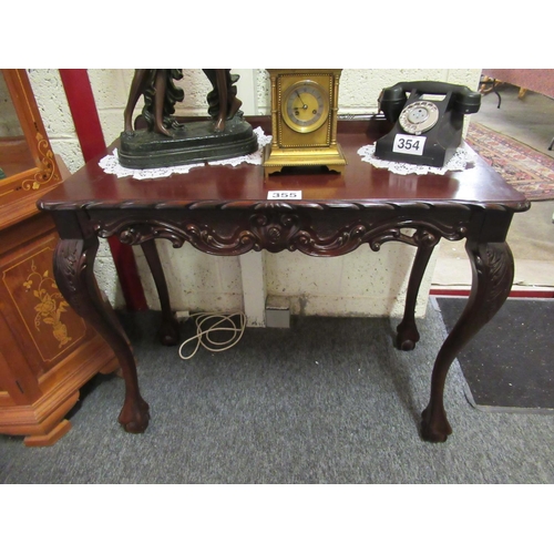 355 - Carved mahogany side table.  H:80cm W:97cm, D:46cm.