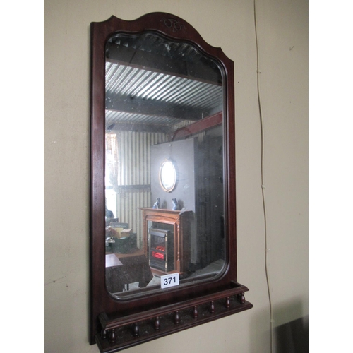 371 - Mahogany framed wall mirror with shelf.  100cm x 54cm.