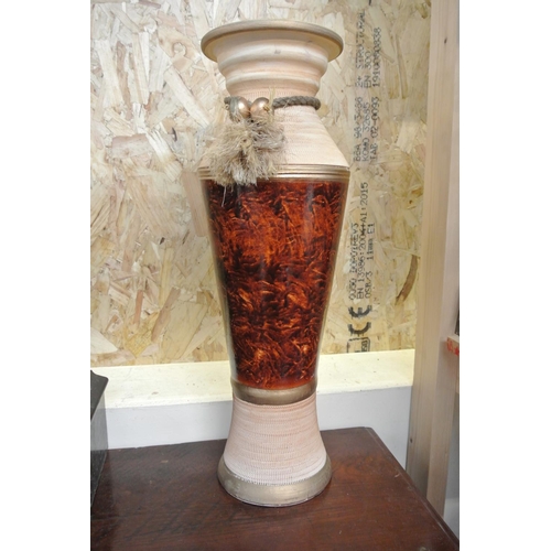 104 - A large ceramic vase.