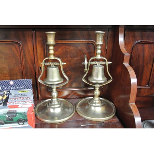 107 - A pair of unsual brass candlestick bells.