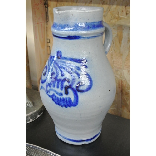 13 - An antique Delftware jug.