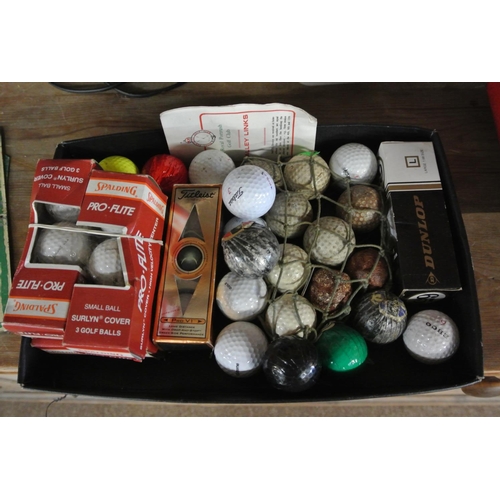 390 - An assortment of various vintage golf balls.