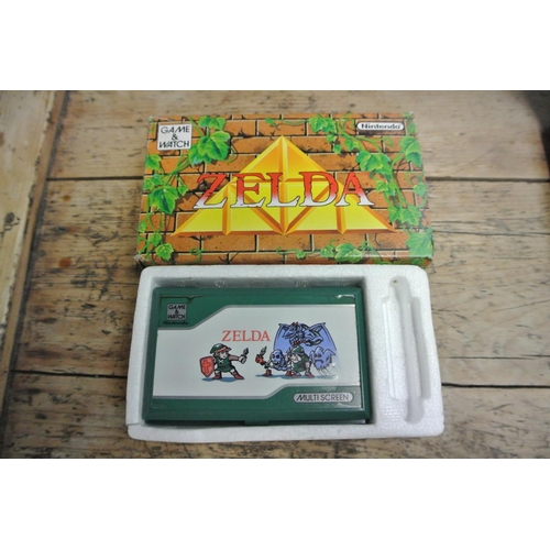 394 - An original vintage Nintendo Game & Watch 'Zelda' game, complete with original box.