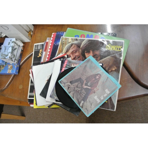 424 - A assortment of various LP's & singles.