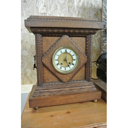 95 - An antique wood cased striking mantle clock.