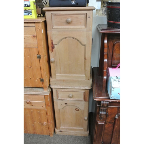 98 - A pair of pine bedside lockers.