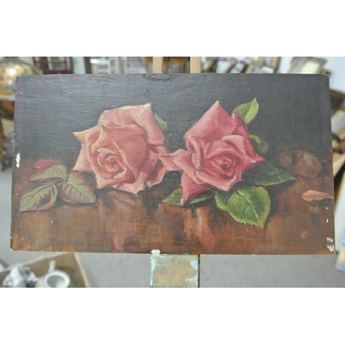 120 - An original antique oil on board study of roses.

Untitled.

Measures 28x16cm.

Signed RM.