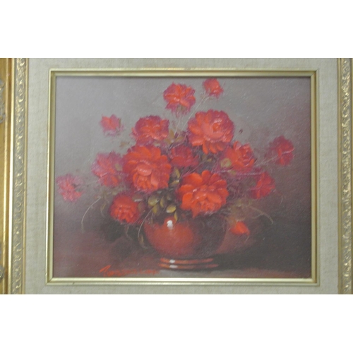 143 - A pair of framed oil on board still life studies of flowers.

Untitled.

Each piece measures 39x34cm... 