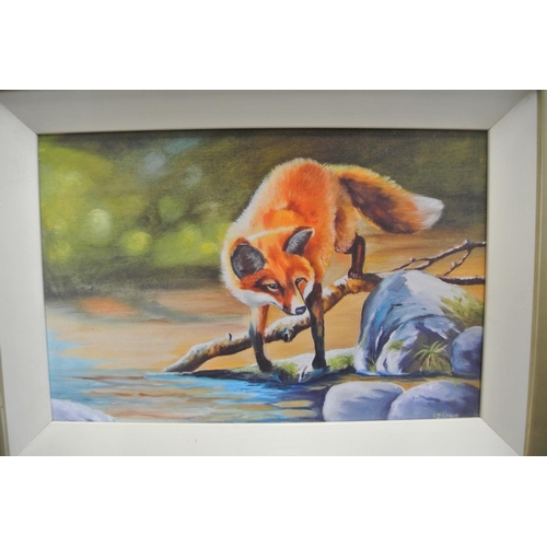 73 - A framed print of a fox.

Untitled.

Measures 42x32cm.