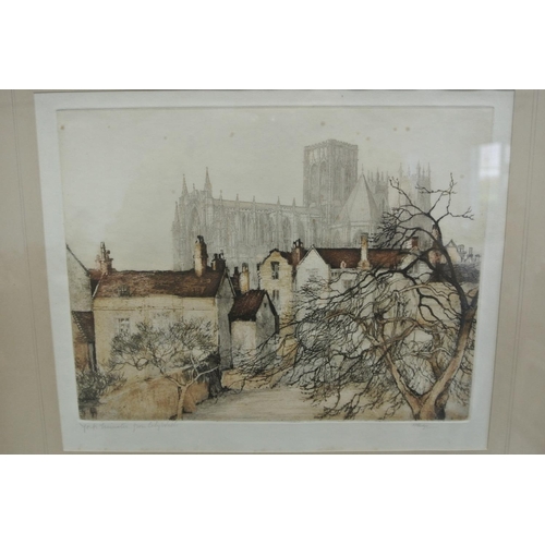 74 - An antique framed limited edition original etching.

Titled 'York Minister from City Walls'.

Measur... 