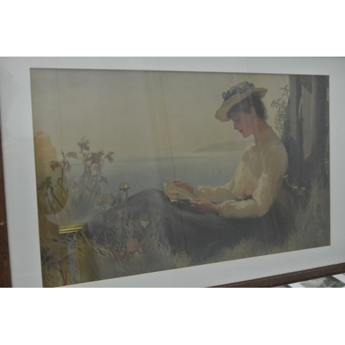 76 - A large framed print of a woman reading.

Untitled.

Measures 75x50cm.

No visible signature.