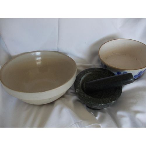 209 - A good lot of kitchenalia including a heavy marble mortar and pestle and two bowls.