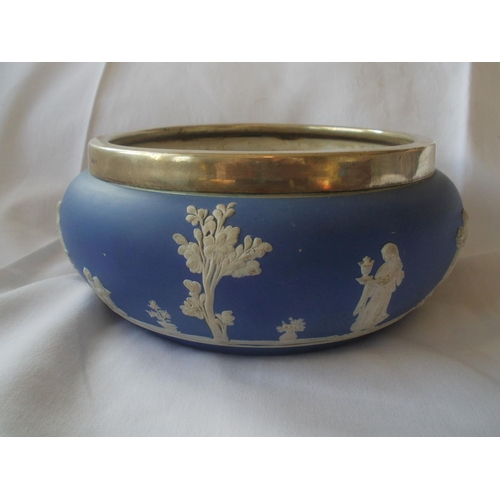 215 - A decorative blue and white Wedgwood fruit bowl with EPNS rim.