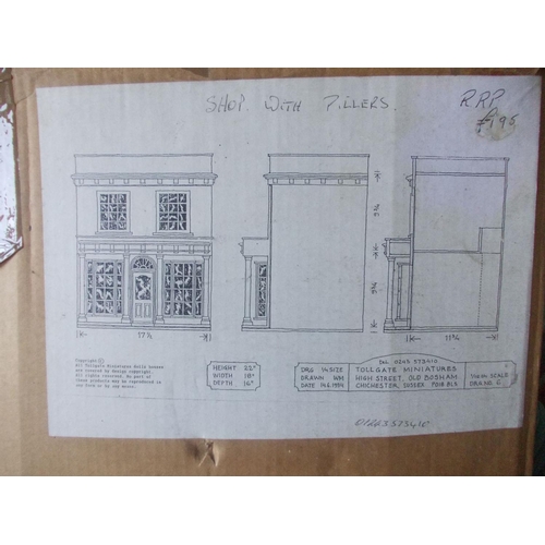 217 - A dolls house Shop with Pillars unbuilt wooden 1/12 scale kit by Tollgate Miniatures. Conents unchec... 