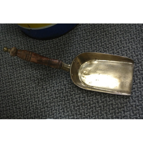 225 - An antique brass shovel with wooden handle.