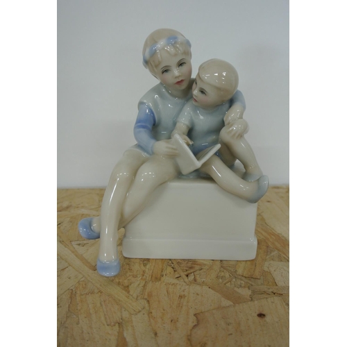 250 - A Royal Doulton figure, 'Storytime', from the reflections series.