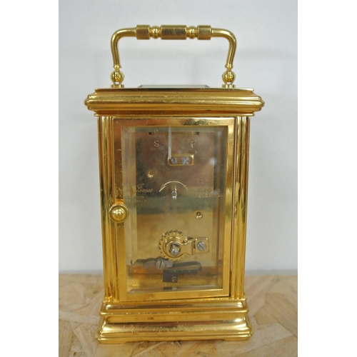 251 - A St James of London gilt cased carriage clock.