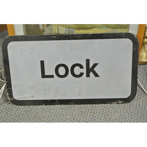 258 - A metal 'Lock' sign.