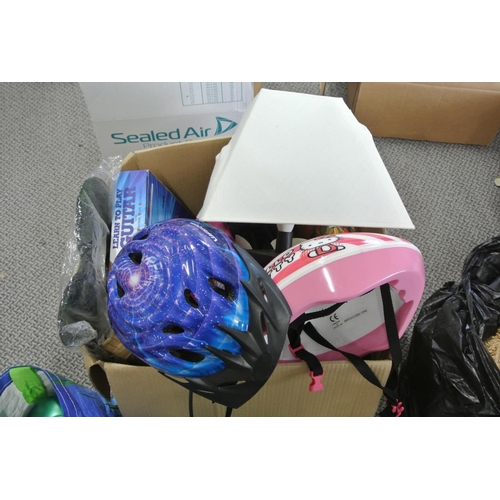 403 - A boxed lot of various items to include table lamp, helmets & more.