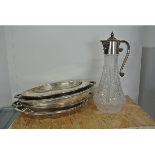 409 - An assortment of silver plated items to include dishes & claret jug.