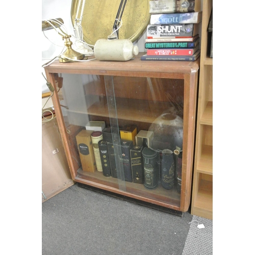 96 - A vintage bookcase with sliding glass doors in need of light restoration.