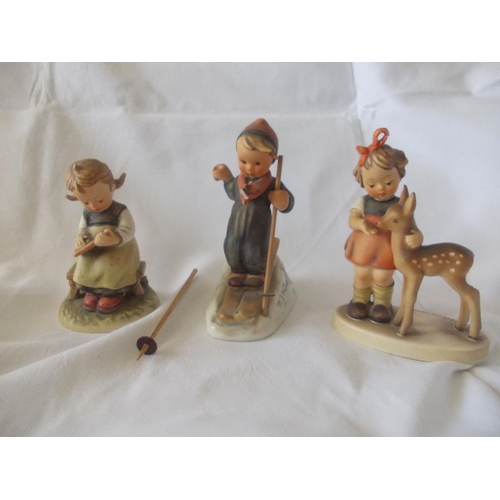 190 - A lot of three vintage Goebel German Hummel figures (A/F).