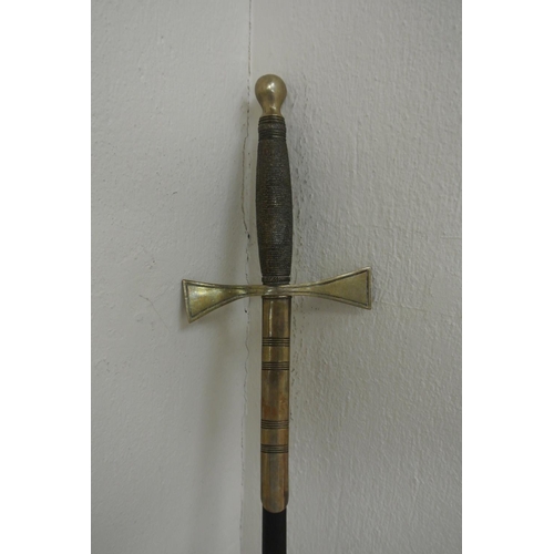 66 - An antique/ vintage Masonic sword with brass hilt/ handle & original leather scabbard.