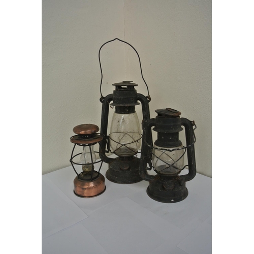 86 - 3 vintage hurricane lanterns.