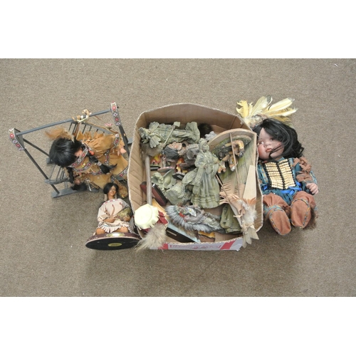 91 - A box of various dolls etc.