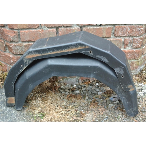 124 - A set of trailer mud guards